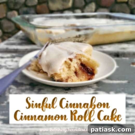 Ultimate Cinnabon Cinnamon Roll Cake 2 Delicious and Easy Cinnabon Cinnamon Roll Cake, freshly baked and glazed