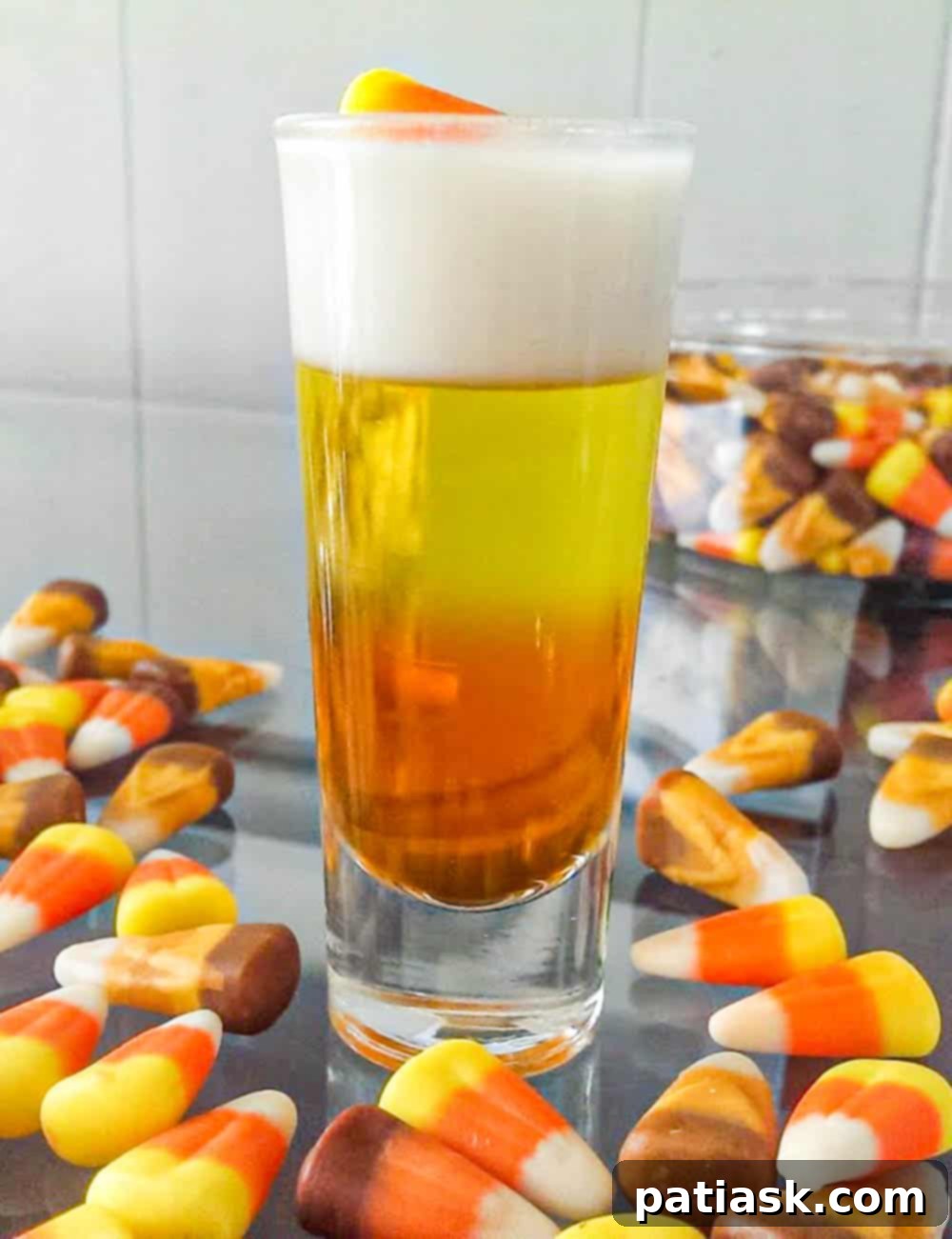 3 Fa'BOO'lous Halloween Jello Shots 3 Two-toned Candy Corn Jello Shots in a row.