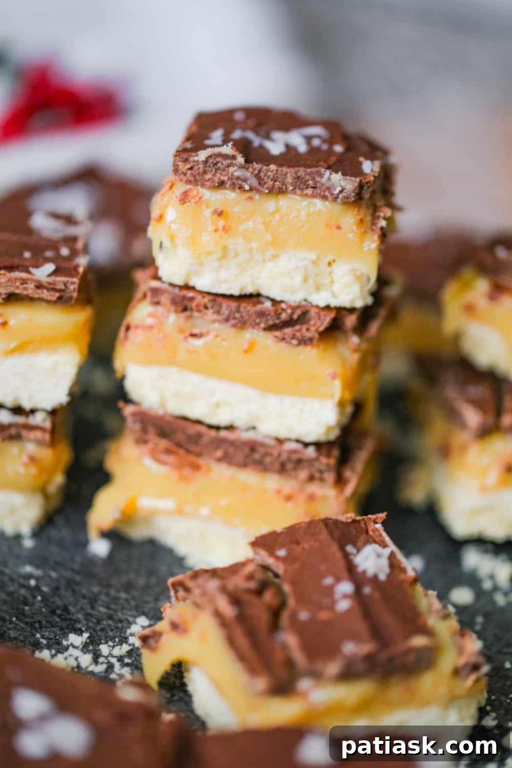 Gilded Millionaire Bars 4 A plate of neatly cut Millionaire Bars ready to serve