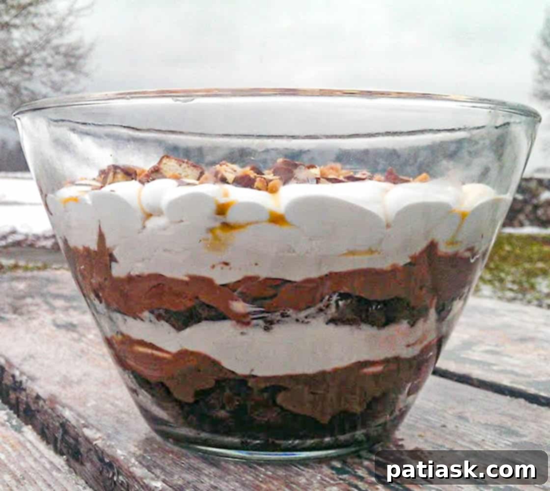 Close-up of the Caramel Brownie Trifle showing the rich textures of brownies, pudding, and cream