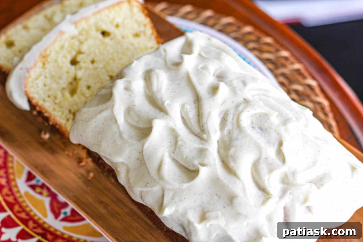 Golden Vanilla Pound Cake with Velvety Vanilla Bean Frosting 7 A beautifully baked Pound Cake Loaf, golden brown and ready for frosting.