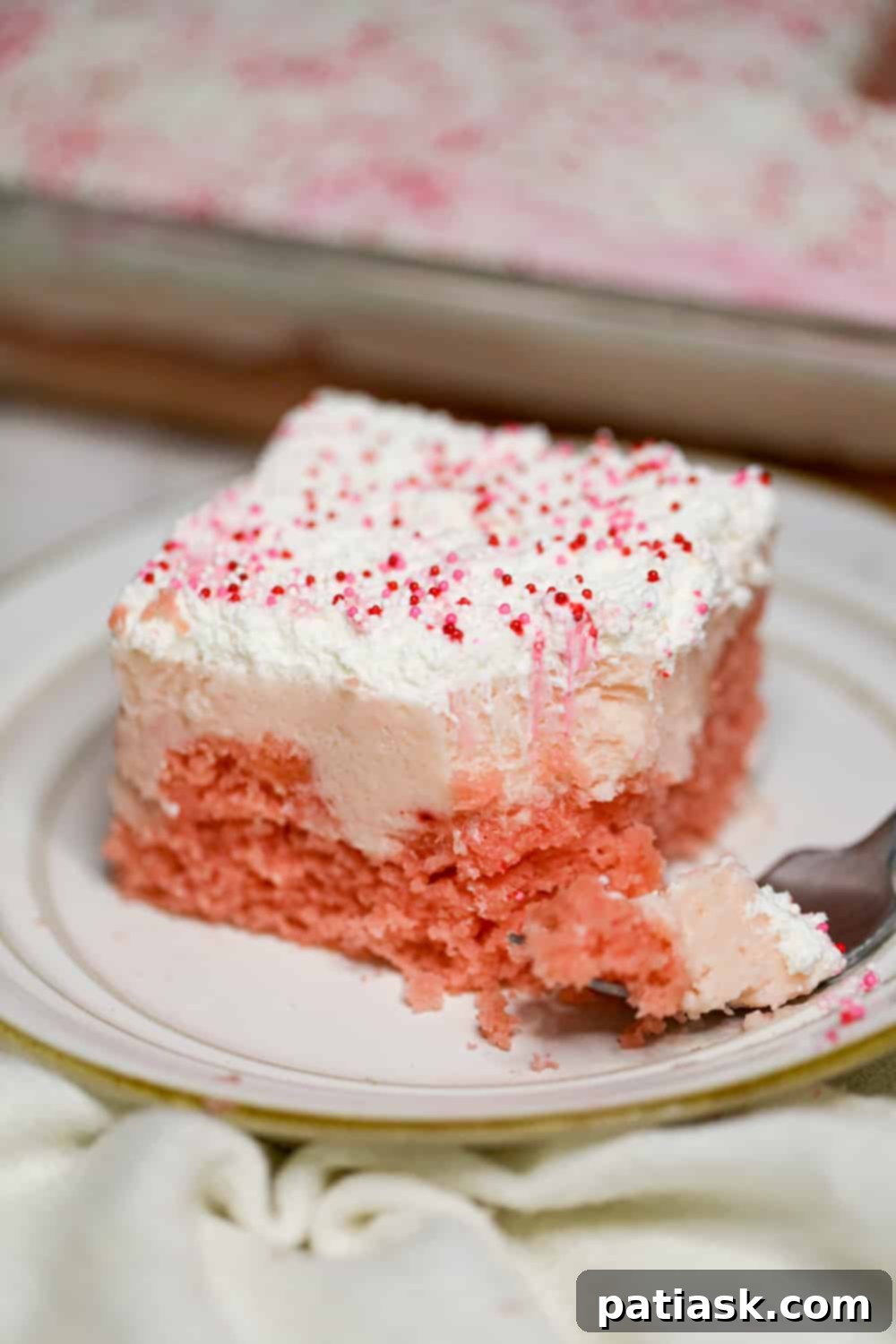 Strawberry Cream Passion Poke Cake 6 strawberry pudding poke cake