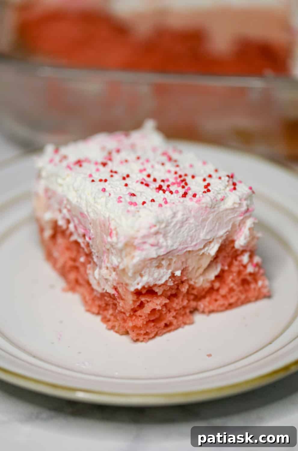 Strawberry Cream Passion Poke Cake 3 strawberry poke cake recipe