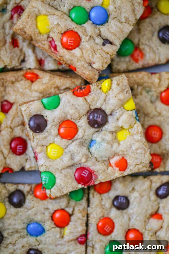 Close-up of freshly baked M&M Cookie Bars with colorful candies