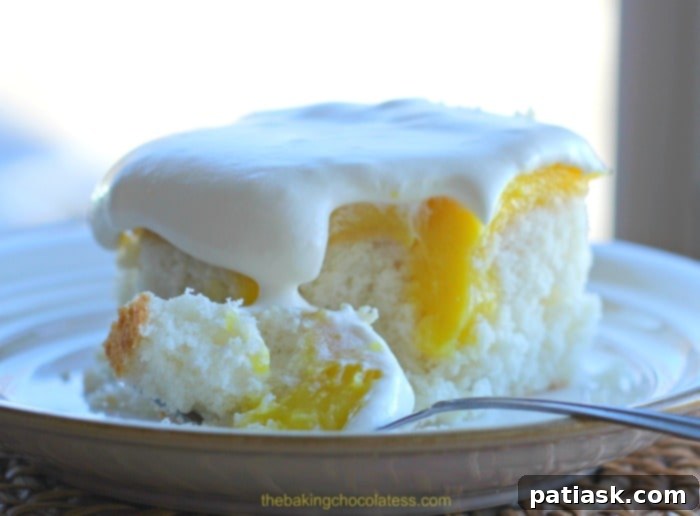 Lemon Burst Poke Cake, a refreshing and tangy dessert