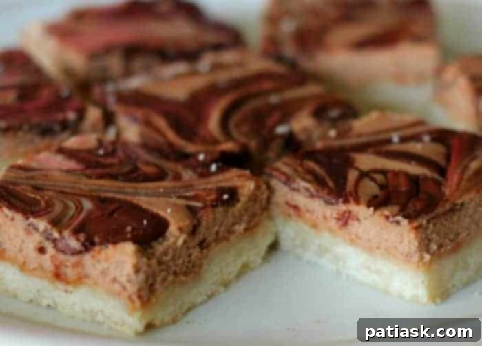 Close-up of a Nutella Cheesecake Bar showing the layers