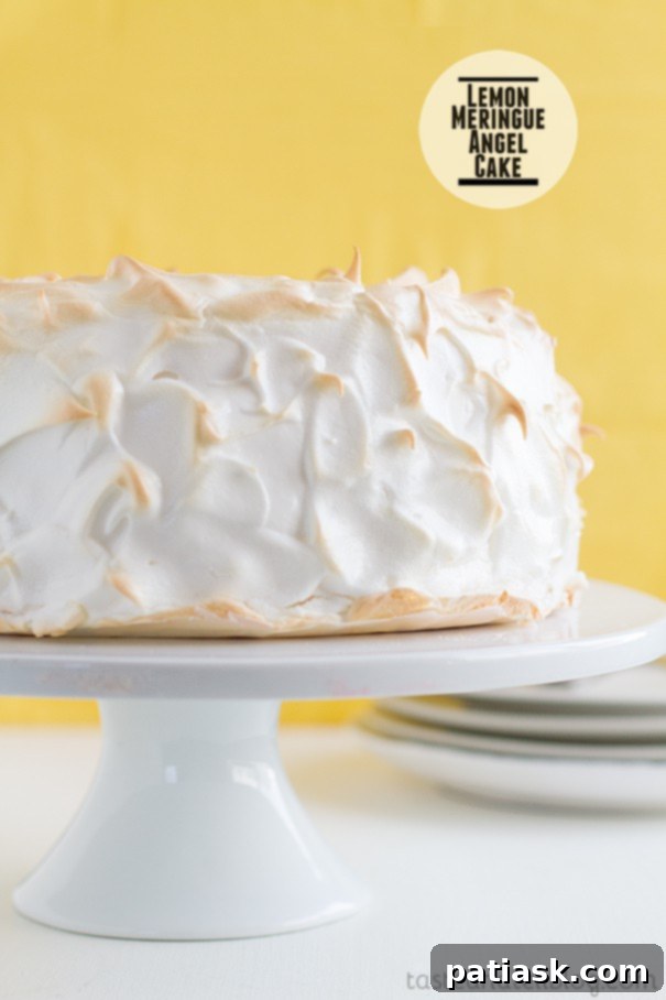 Lemon-Meringue-Angel-Cake-recipe-Taste-and-Tell-1 Lemon Meringue Angel Food Cake from Taste Tell & Blog, a light and fluffy dessert combining two classics.