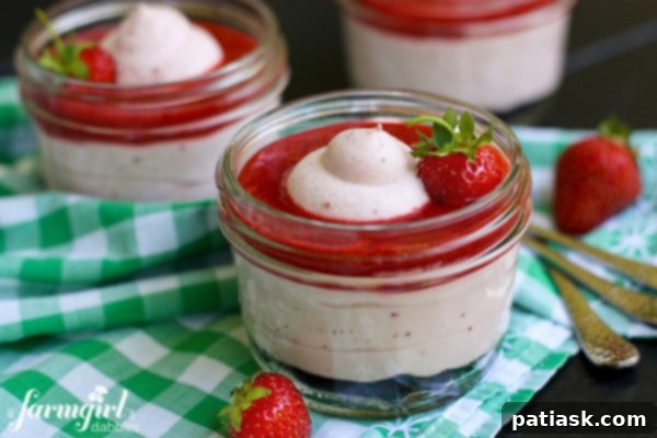Creamy-Strawberry-Fluff-with-Fresh-Strawberry-Sauce-a-no-bake-dessert-in-jars_AFarmgirlsDabbles_AFD-2 Creamy Strawberry Fluff with Fresh Strawberry Sauce served in jars, a gorgeous no-bake dessert from A Farm Girl Dabbles.