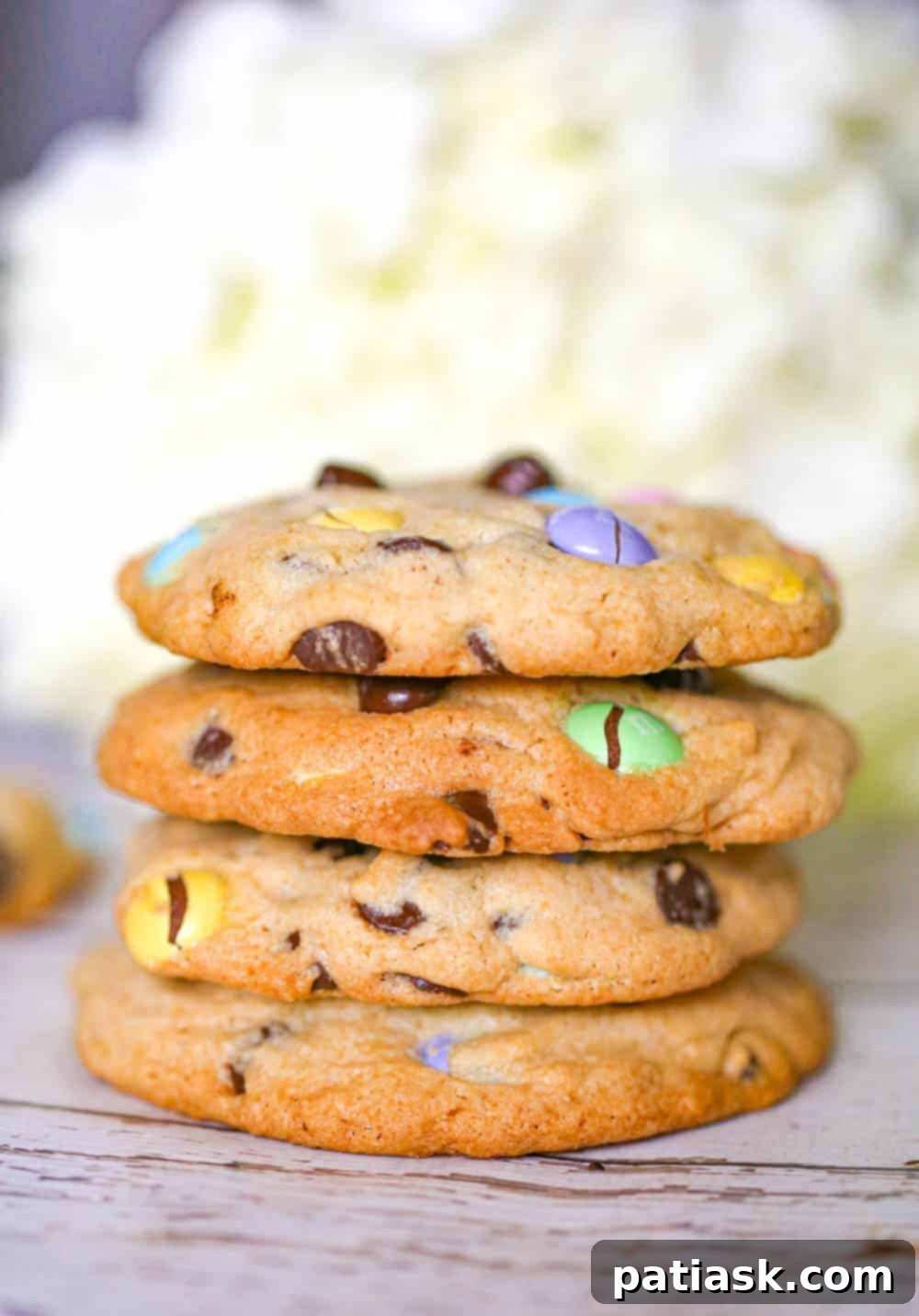 Celebrate National Chocolate Chip Day with 20 Irresistible Cookie Recipes 10 M&M Chocolate Chip Candy Cookies with colorful M&M's