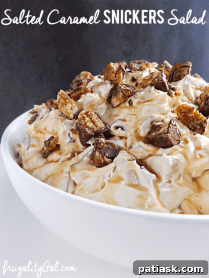 Rich and creamy Salted Caramel Snickers Dip, perfect for parties and game day.