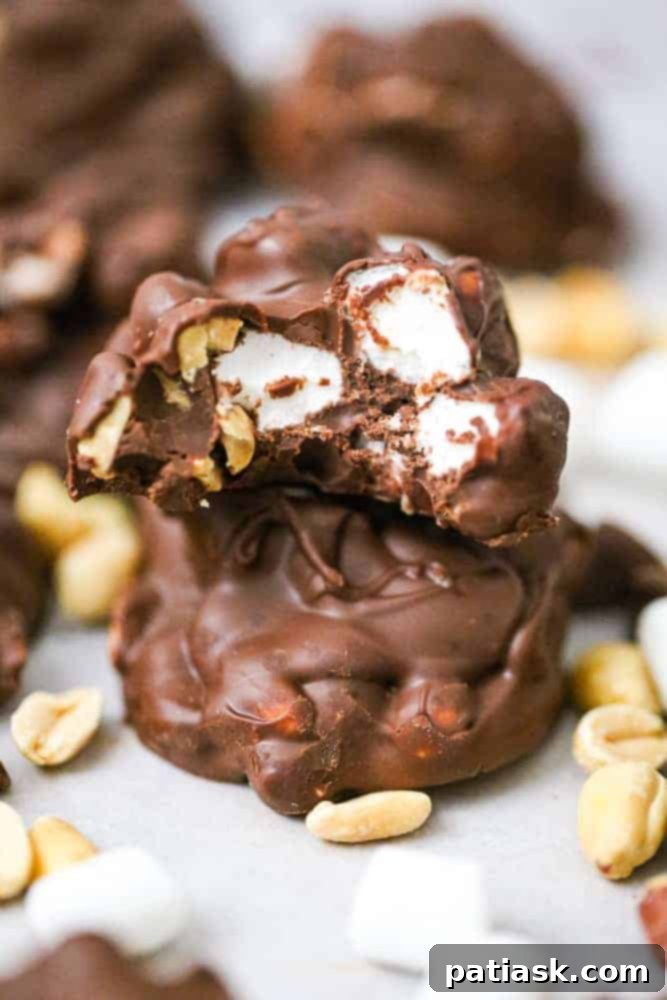 2020's 10 Most Loved Dessert Recipes 8 Easy Fluffy Chocolate Marshmallow Peanut Clusters on a platter