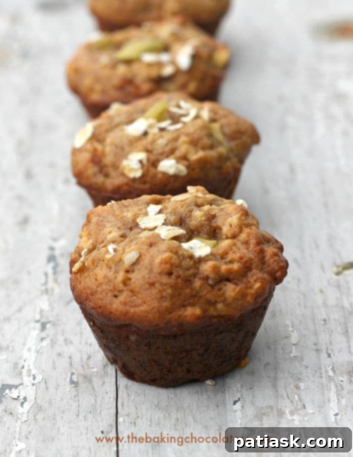 Wholesome Apple Peanut Butter Mini Muffins 3 Close-up of fluffy Skinny Apple Peanut Butter Mini Muffins on a wire rack.