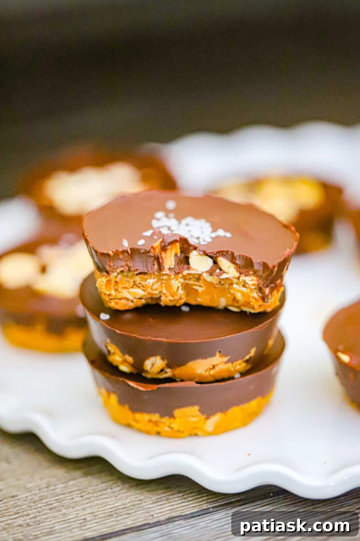 Peanut Butter Oatmeal Dream Bites 5 Bite taken out of a No Bake Peanut Butter Oatmeal Cup