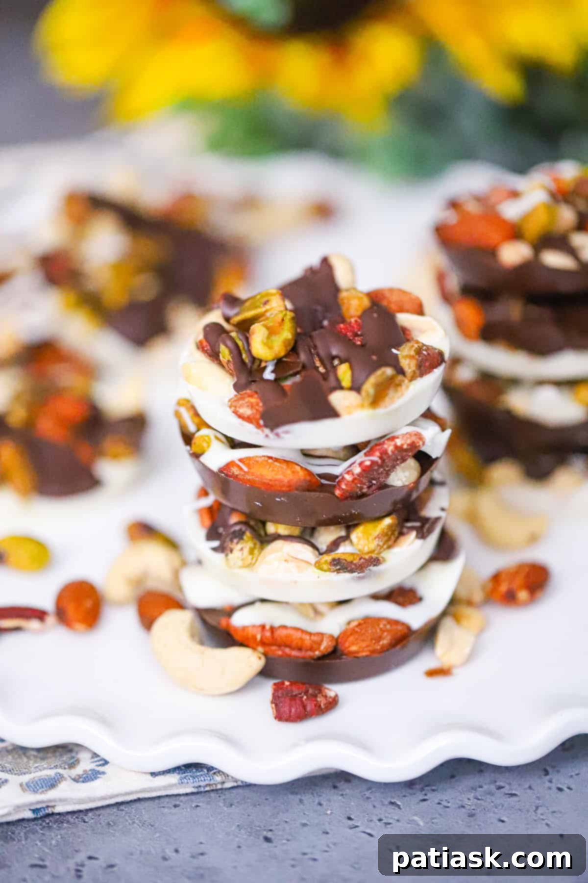 Close-up of chocolate and nut snack cups.